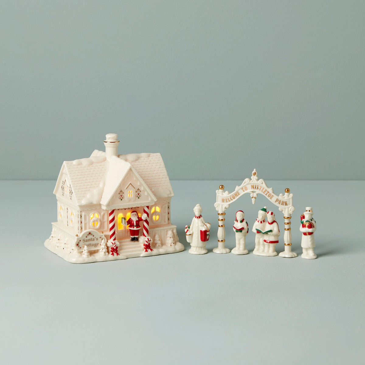 Mistletoe Park Light-Up Cottage & Caroler Figurine
